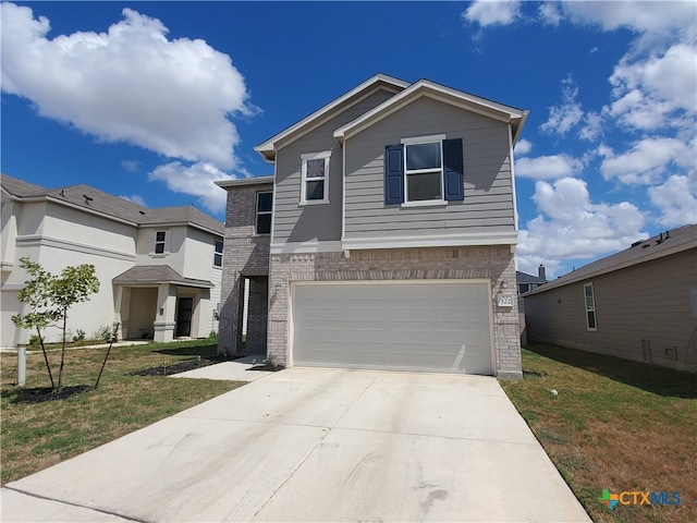 front of property with a front lawn and a garage