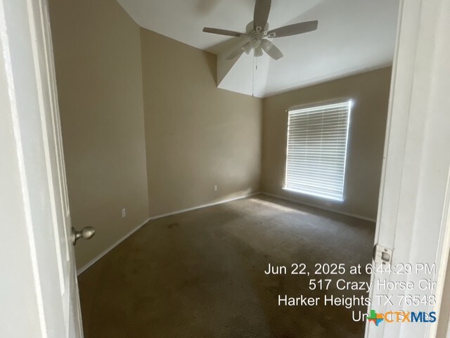 517 Crazy Horse Cir, Harker Heights, TX 76548 - spare room featuring carpet flooring and ceiling fan