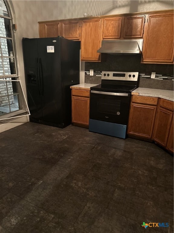 kitchen with stainless steel range with electric stovetop, black refrigerator with ice dispenser, range hood, and tasteful backsplash