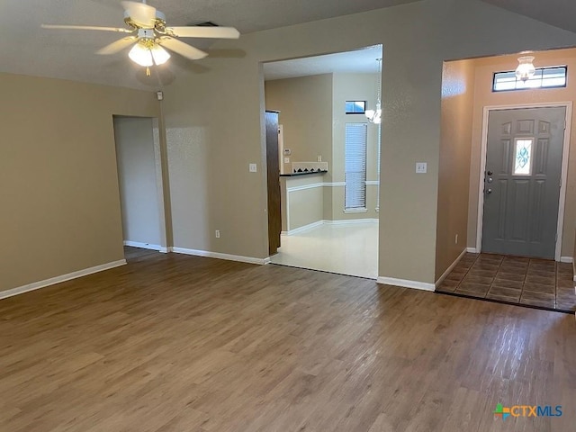 4110 Windwood Dr, Killeen, TX 76542 - foyer featuring wood finished floors, ceiling fan, and baseboards
