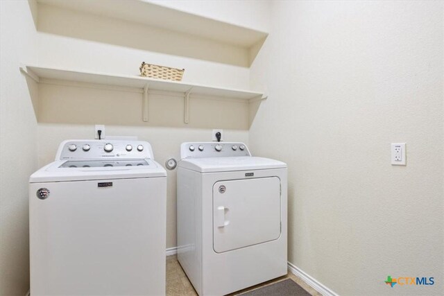 701 Curtis Dr, Killeen, TX 76542 - clothes washing area featuring separate washer and dryer, baseboards, and laundry area