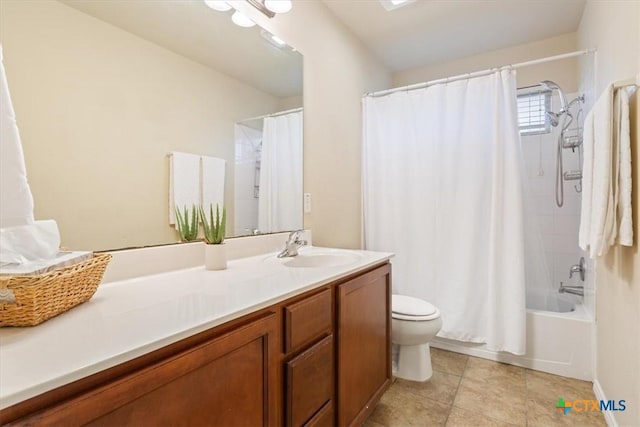 701 Curtis Dr, Killeen, TX 76542 - full bathroom featuring shower / tub combo with curtain, toilet, vanity, and tile patterned floors