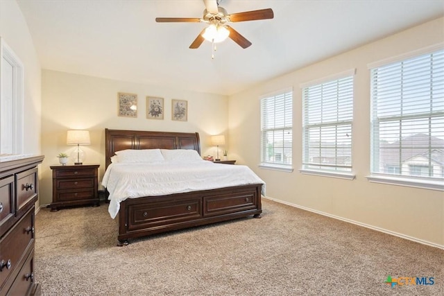 701 Curtis Dr, Killeen, TX 76542 - bedroom with light colored carpet, baseboards, and multiple windows