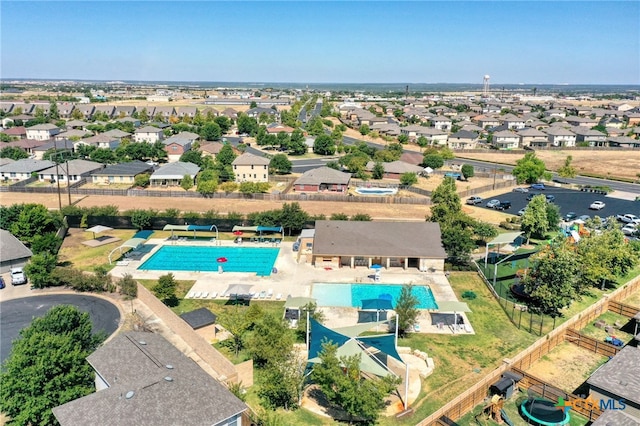 birds eye view of property with a residential view