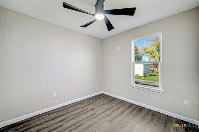 212 S Walnut Ave, Luling, TX 78648 - unfurnished room with wood finished floors and a ceiling fan