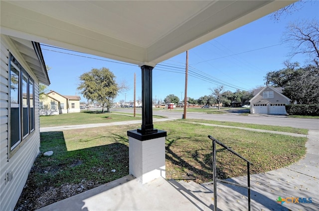 view of yard featuring a garage