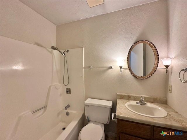 full bathroom featuring bathtub / shower combination, vanity, and toilet