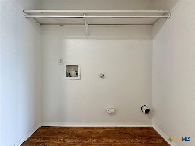 laundry area with gas dryer hookup, washer hookup, and dark hardwood / wood-style flooring