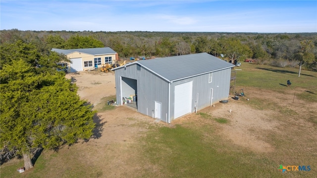 view of outbuilding featuring a garage