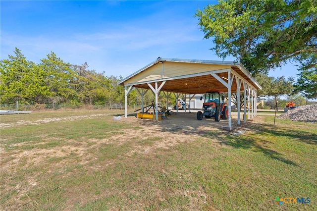 view of yard featuring a carport