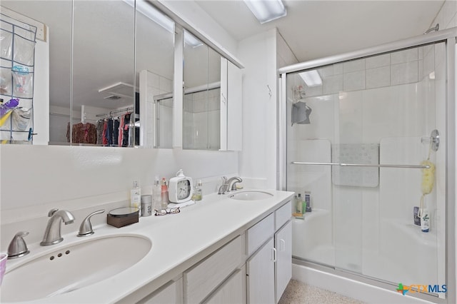 bathroom featuring vanity and walk in shower