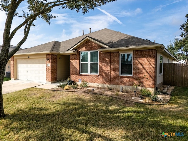 ranch-style house with a garage and a front yard