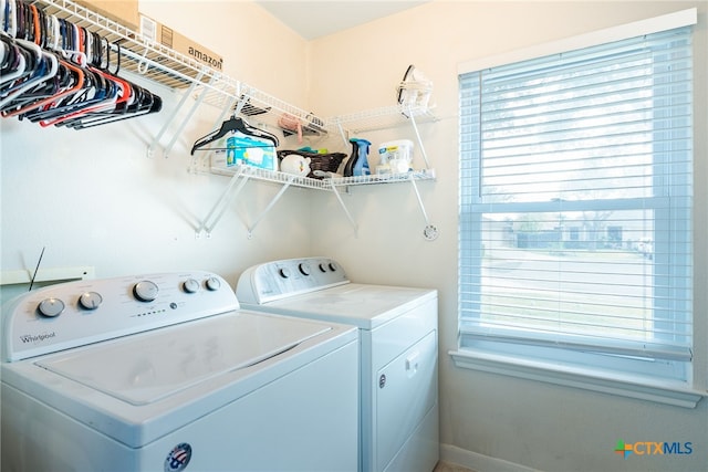 washroom featuring washer and dryer