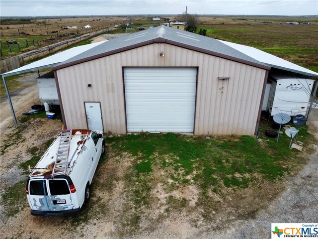 garage with a rural view