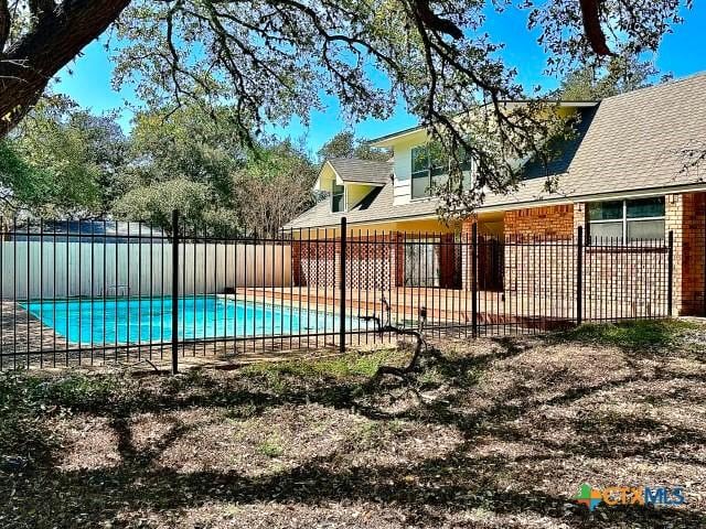 view of pool featuring fence and a fenced in pool