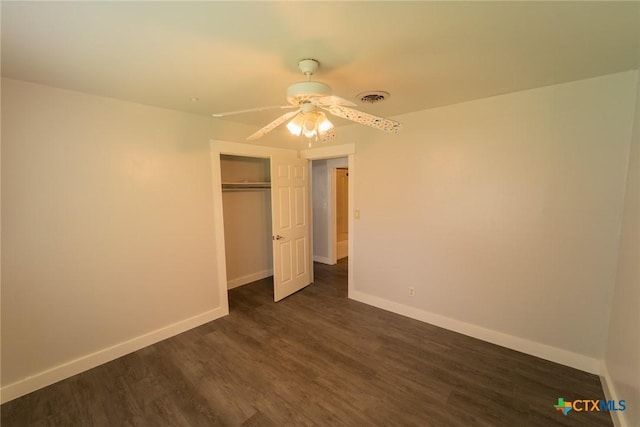 3001 Hummingbird St, Victoria, TX 77901 - unfurnished bedroom with dark wood-type flooring, a closet, and a ceiling fan