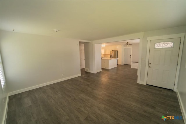 3001 Hummingbird St, Victoria, TX 77901 - unfurnished living room featuring dark wood finished floors and ceiling fan