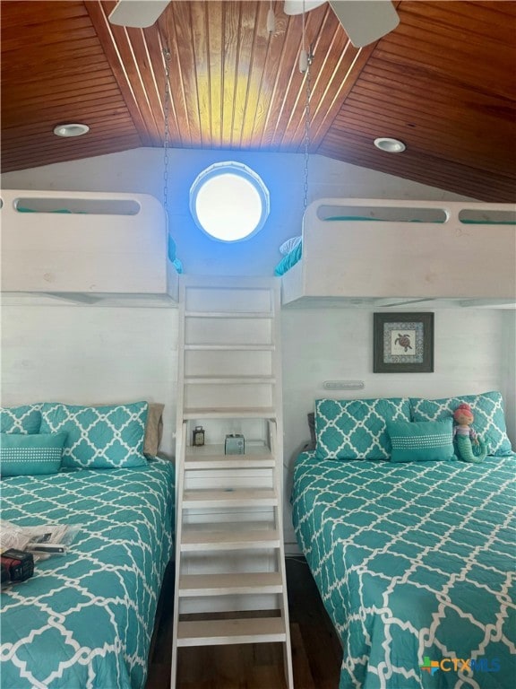 bedroom featuring lofted ceiling, hardwood / wood-style flooring, and wood ceiling