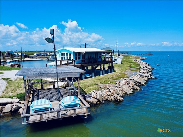 dock area with a water view