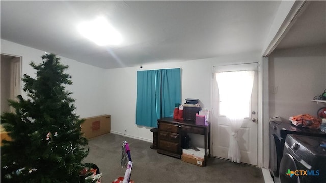 4305 Willow St, Corpus Christi, TX 78411 - carpeted bedroom with washing machine and clothes dryer