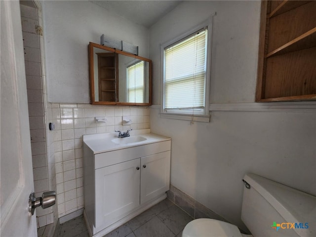 4305 Willow St, Corpus Christi, TX 78411 - half bathroom featuring toilet and vanity