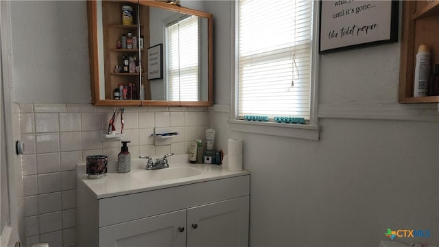 4305 Willow St, Corpus Christi, TX 78411 - bathroom with vanity and backsplash