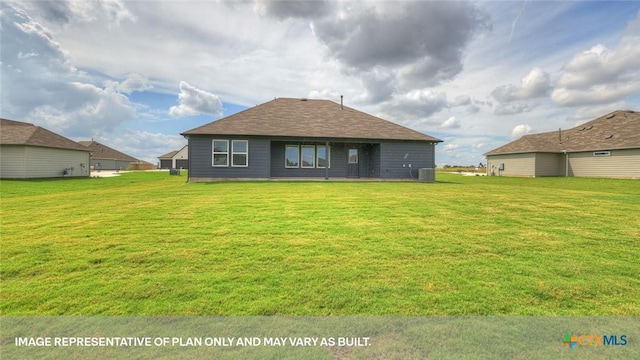 620 Radley Rd, Lockhart, TX 78644 - rear view of house with a yard and central air condition unit