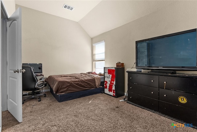 bedroom featuring visible vents, carpet flooring, baseboards, and lofted ceiling