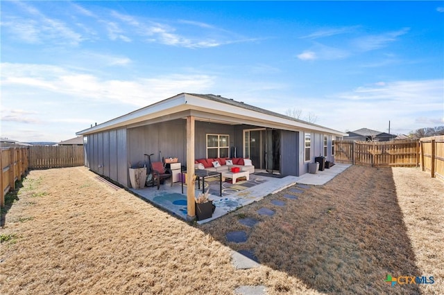 back of house with a patio area