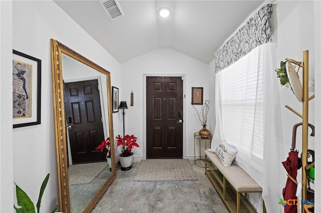 entrance foyer with lofted ceiling