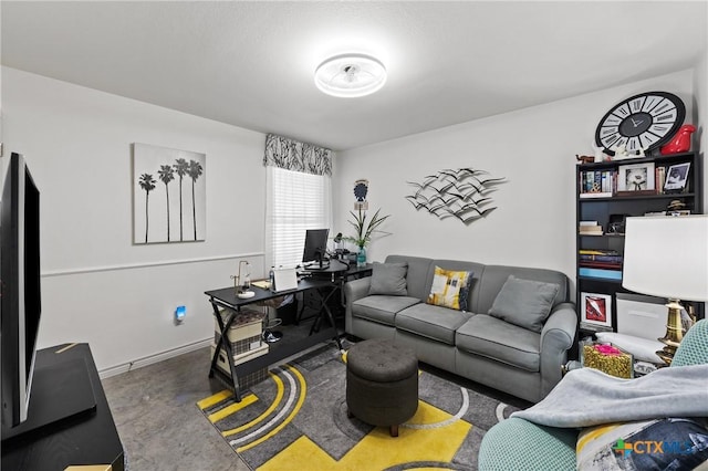 living room with concrete flooring