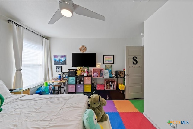 bedroom featuring ceiling fan