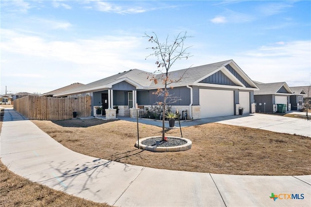 ranch-style house featuring a garage