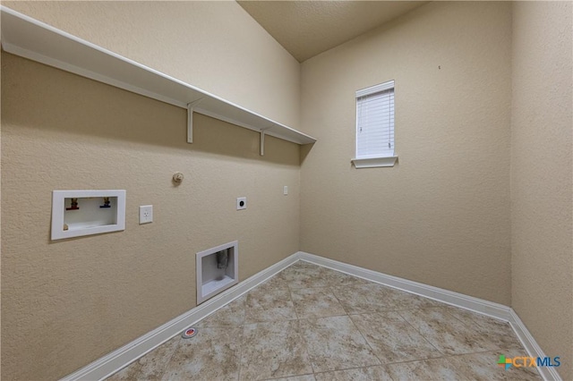26815 Tulip Mdw, Boerne, TX 78015 - laundry room with gas dryer hookup, washer hookup, tile patterned flooring, and electric dryer hookup