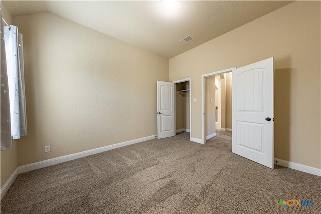 26815 Tulip Mdw, Boerne, TX 78015 - unfurnished bedroom with lofted ceiling and carpet floors