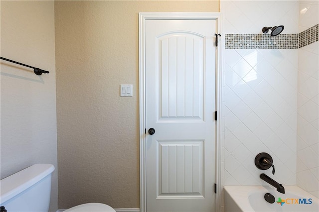 26815 Tulip Mdw, Boerne, TX 78015 - bathroom featuring shower / bathtub combination and a textured wall