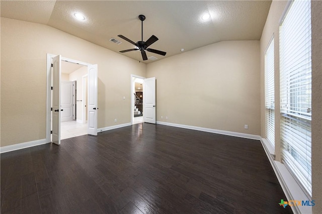 26815 Tulip Mdw, Boerne, TX 78015 - unfurnished bedroom with lofted ceiling, wood finished floors, and ceiling fan
