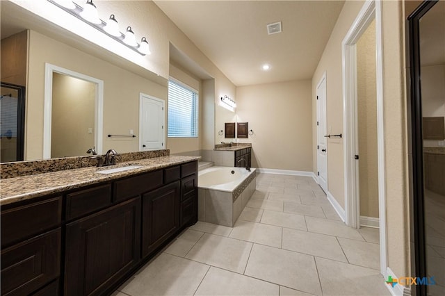 26815 Tulip Mdw, Boerne, TX 78015 - full bath with a bath, vanity, an enclosed shower, tile patterned floors, and recessed lighting