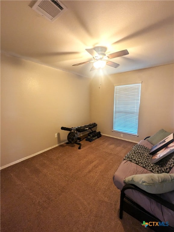 unfurnished room featuring carpet floors and ceiling fan