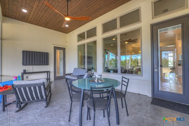 view of patio with ceiling fan, outdoor dining area, and outdoor lounge area