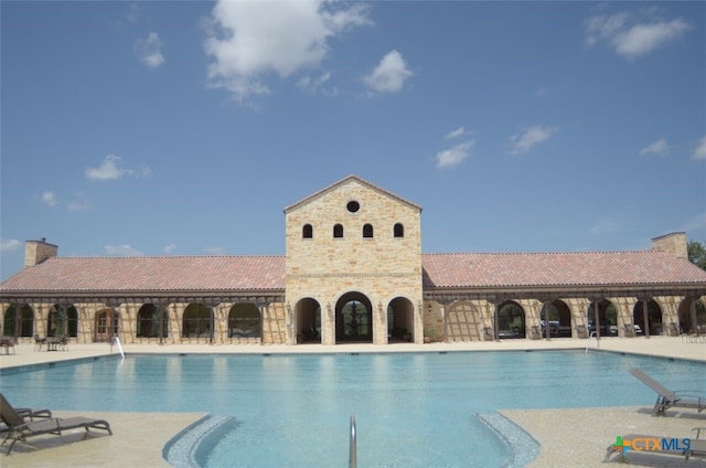 pool featuring a patio