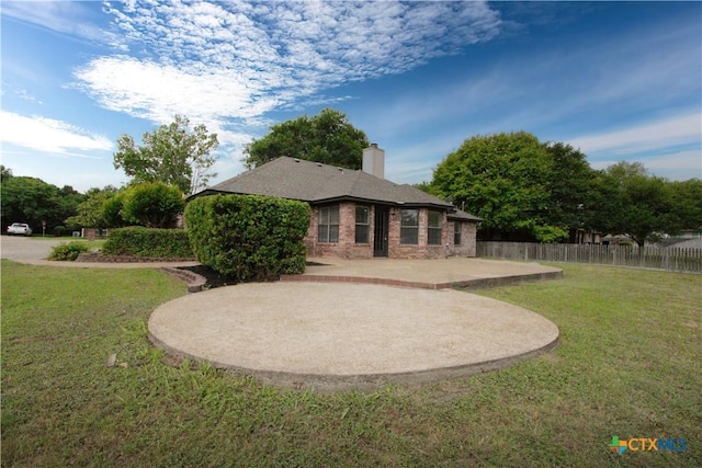 2216 Smith Bluff Rd, Salado, TX 76571 - back of property featuring a patio area, a chimney, and brick siding