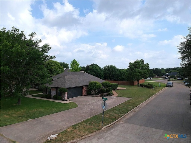 2216 Smith Bluff Rd, Salado, TX 76571 - view of front of property featuring driveway, a front lawn, an attached garage, and brick siding