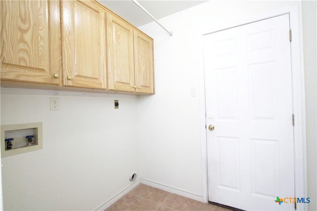 2216 Smith Bluff Rd, Salado, TX 76571 - washroom with cabinet space, hookup for a washing machine, hookup for an electric dryer, baseboards, and light tile patterned flooring