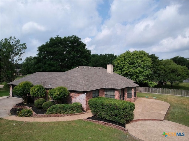 2216 Smith Bluff Rd, Salado, TX 76571 - ranch-style house with brick siding, a chimney, and roof with shingles