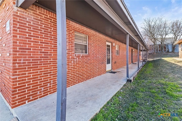 view of home's exterior with a patio