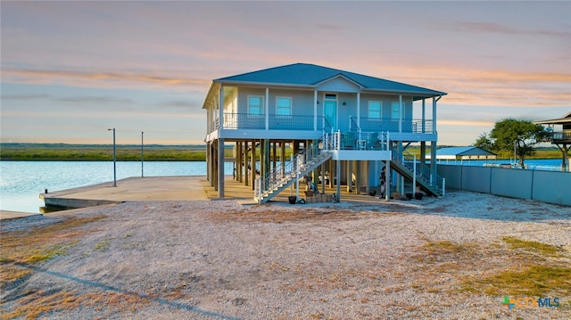 coastal home featuring a water view