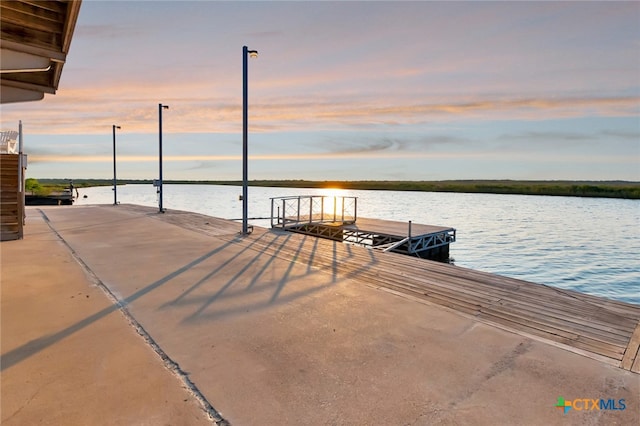 view of dock with a water view