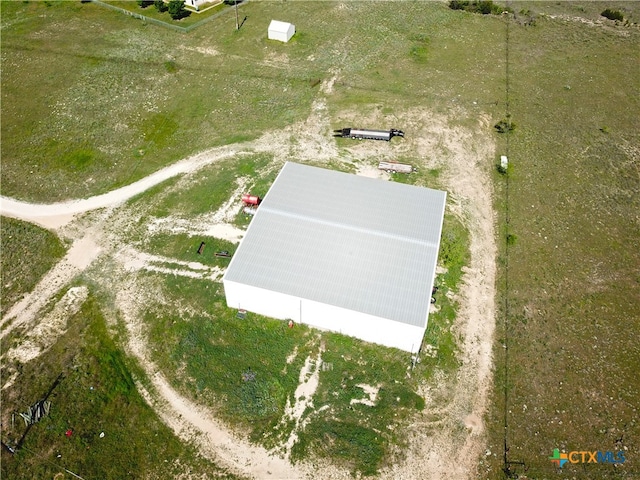 birds eye view of property featuring a rural view