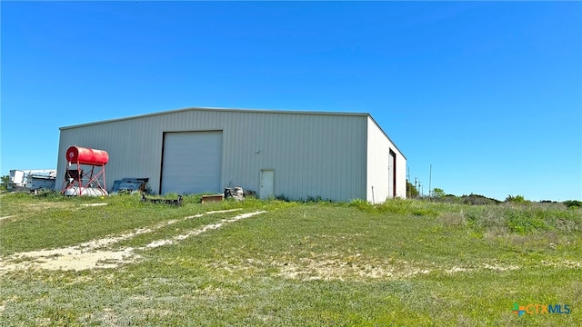 view of outdoor structure with a garage